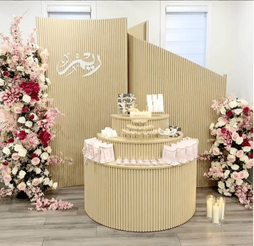 Curved backdrop and balloon setup styled by Sparkle Events