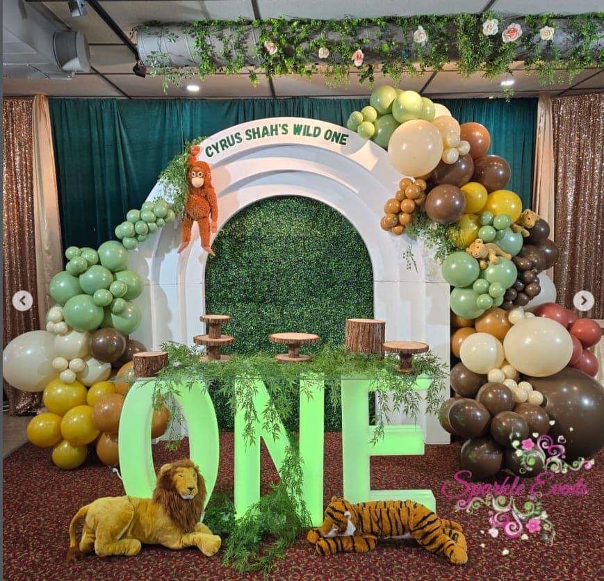 Safari-themed first birthday setup by Sparkle Events