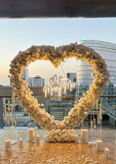 White floral heart arch styled by Sparkle Events