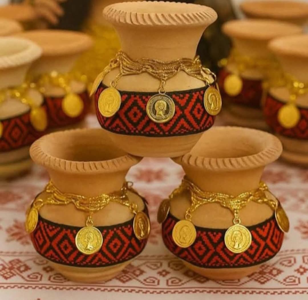 mini clay jar with ribbon