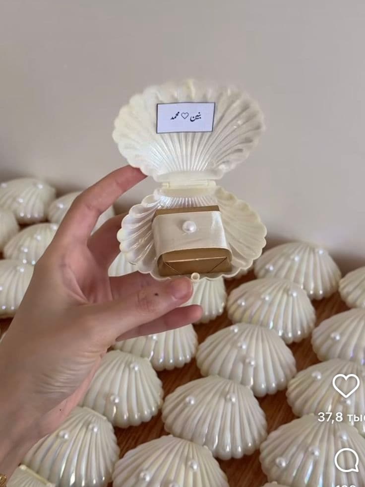 shell boxes with chocolate and name card