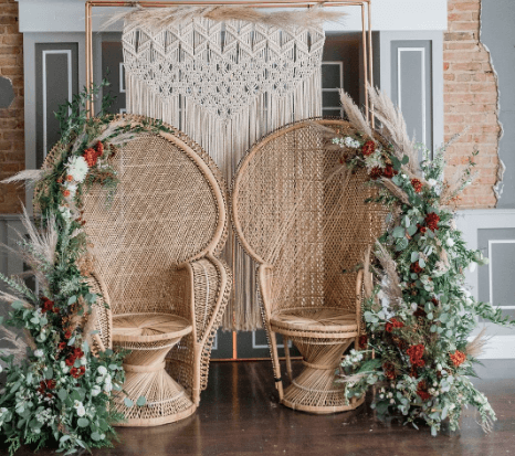 Two rattan peacock chairs from the Sparkle Events rental range