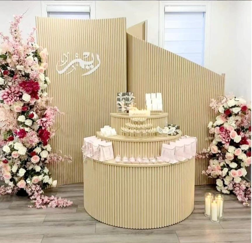 Curved backdrop and balloon setup styled by Sparkle Events