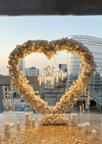 White floral heart arch styled by Sparkle Events