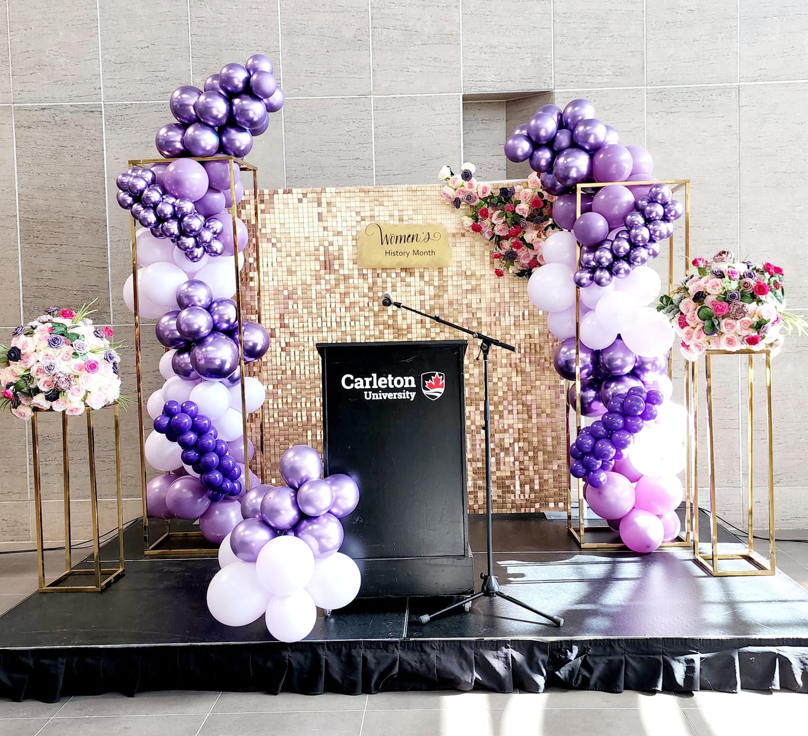 Corporate Stage With Purple Balloon Columns